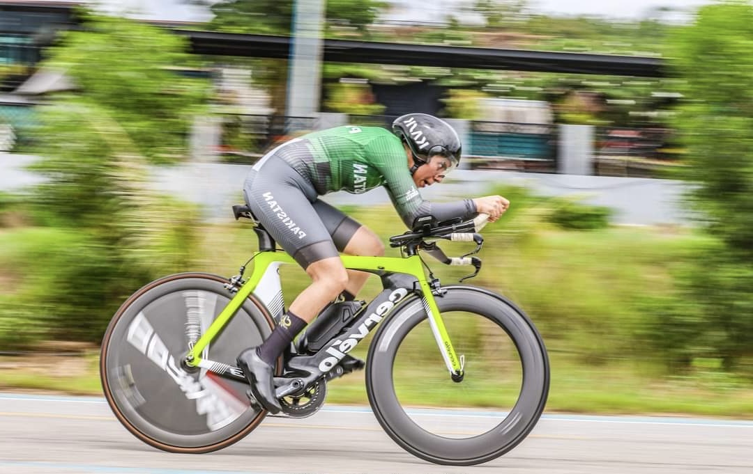 Basim Chaudhry racing on a bicycle